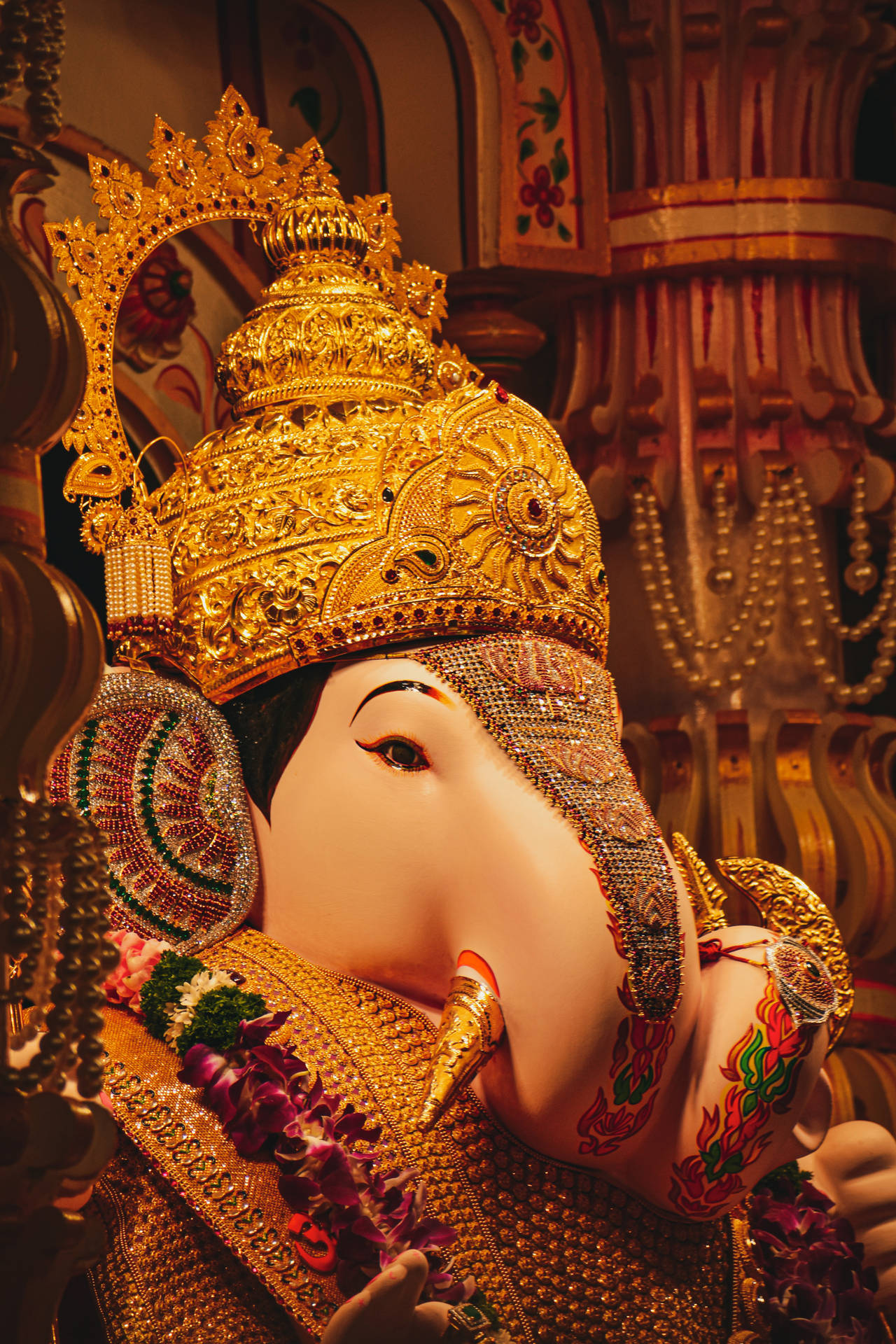 Ganesh 4k With Gold Accessories Background