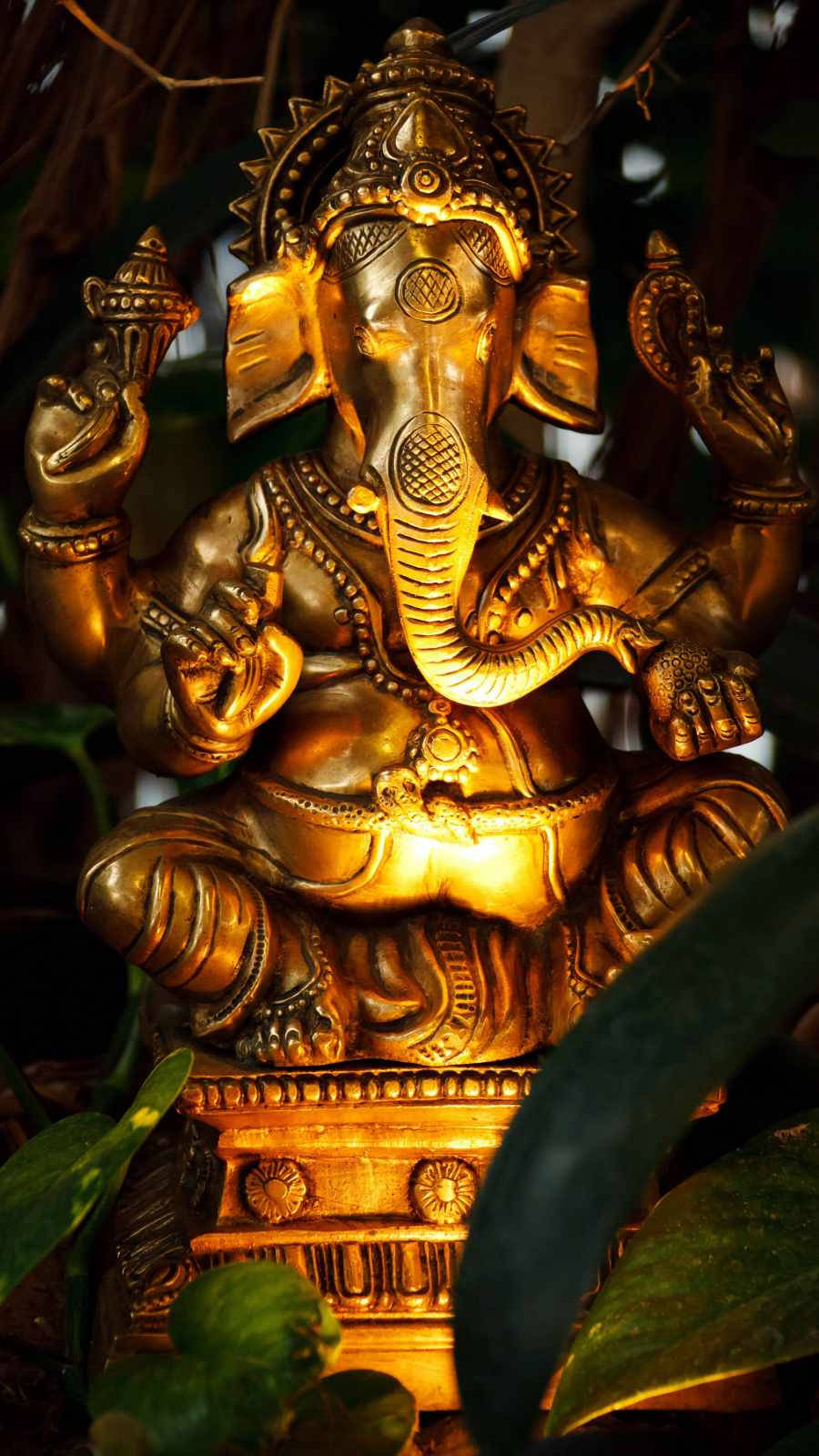 Ganesha Luminous Gold Figure Background
