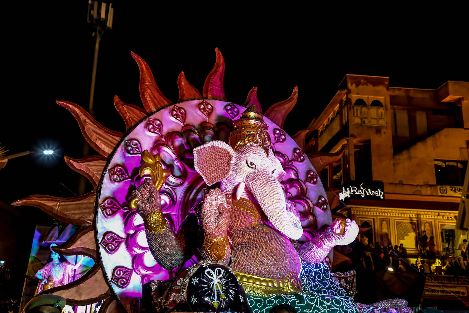 Ganesha Statuette Parade Background