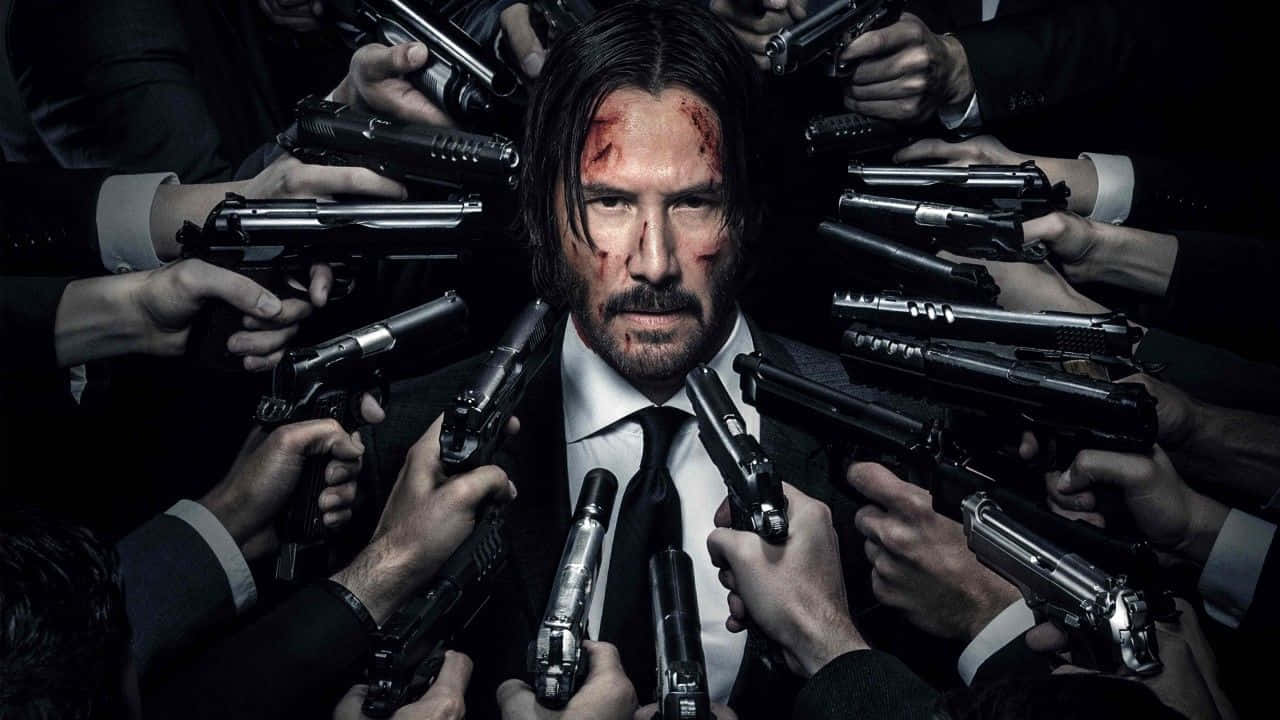 Gangsters With Guns Aiming At John Wick Background