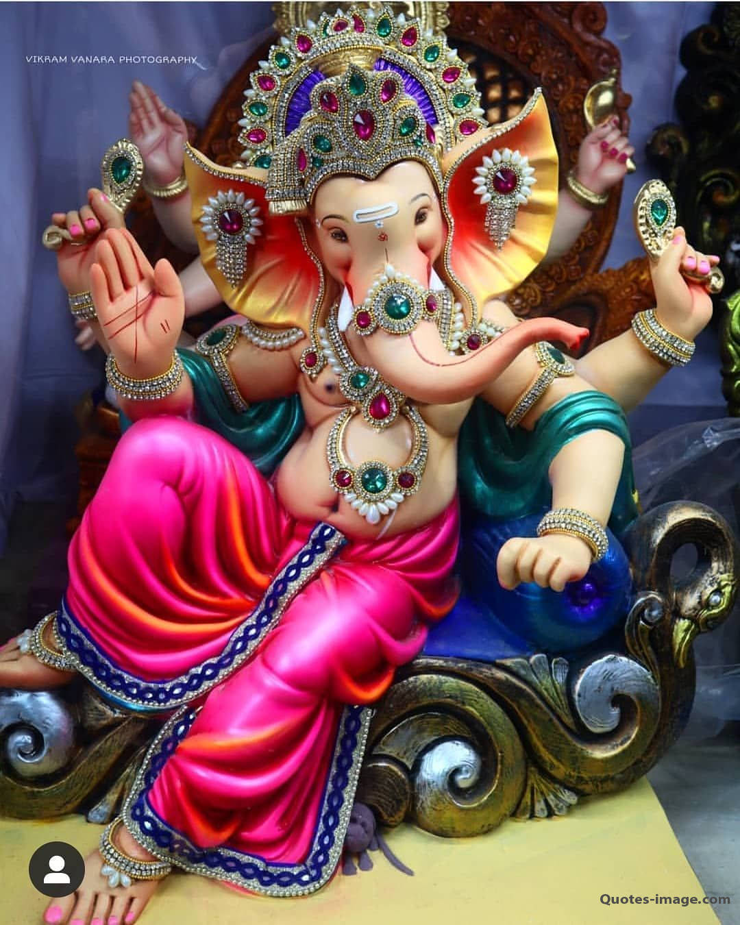 Ganpati Hd Sitting On A Blue Throne Background