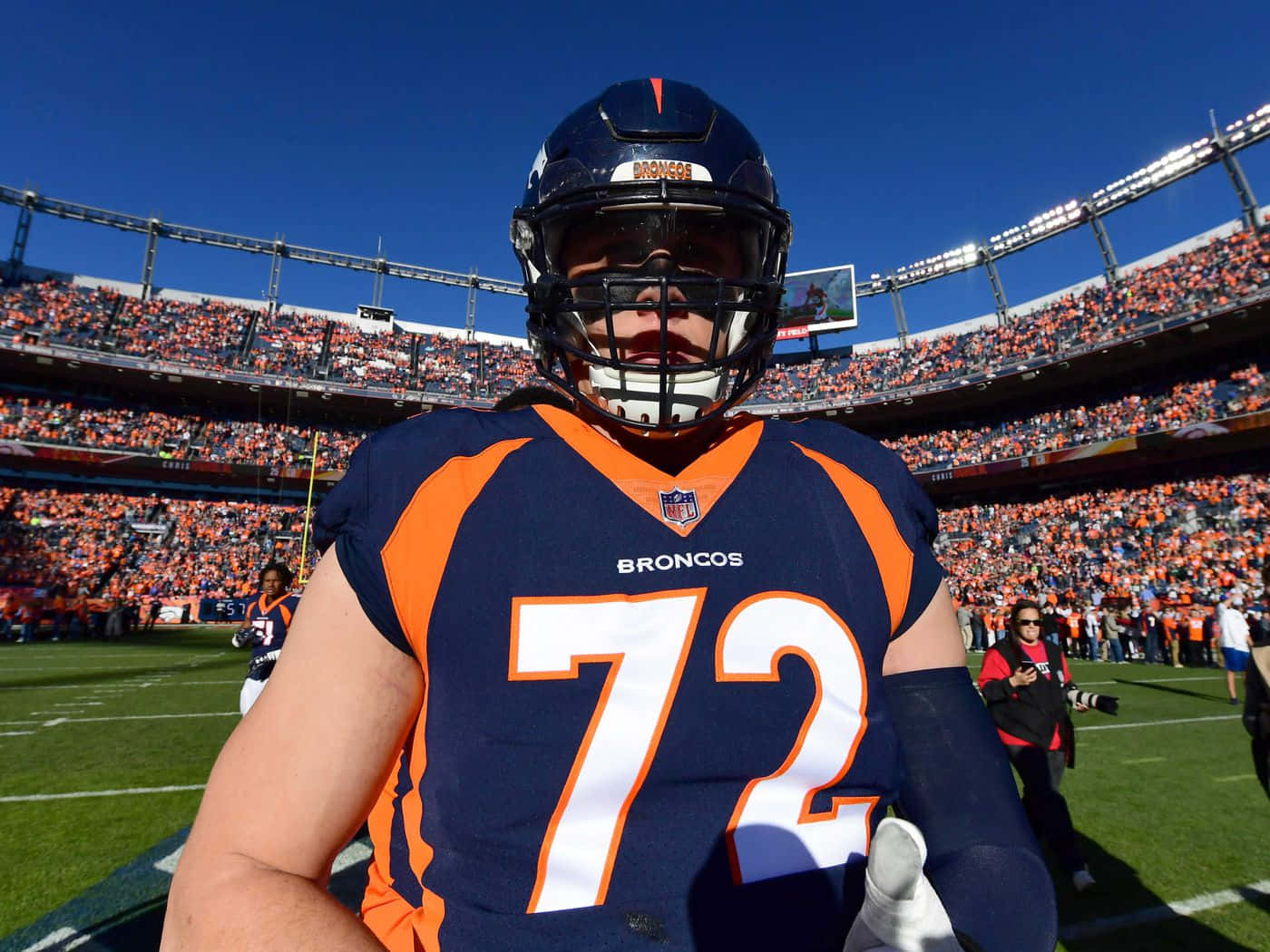 Garett Bolles Against The Blue Sky Background