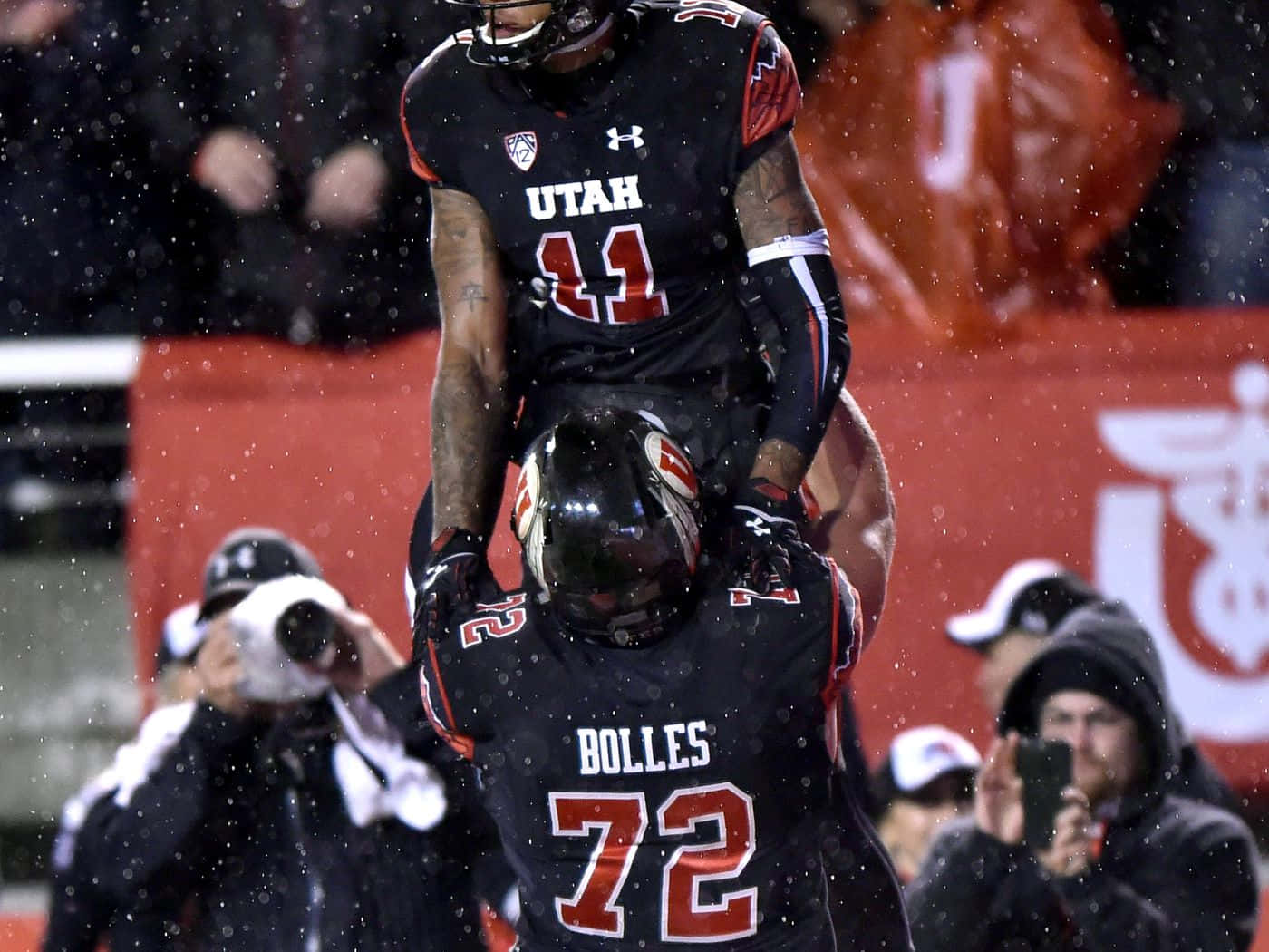 Garett Bolles Lifting Raelon Singleton Background