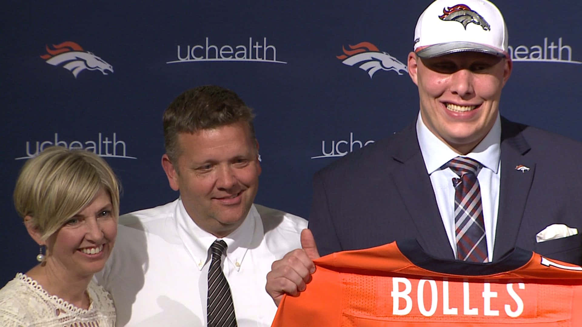 Garett Bolles With His Family In Nfl Draft Background
