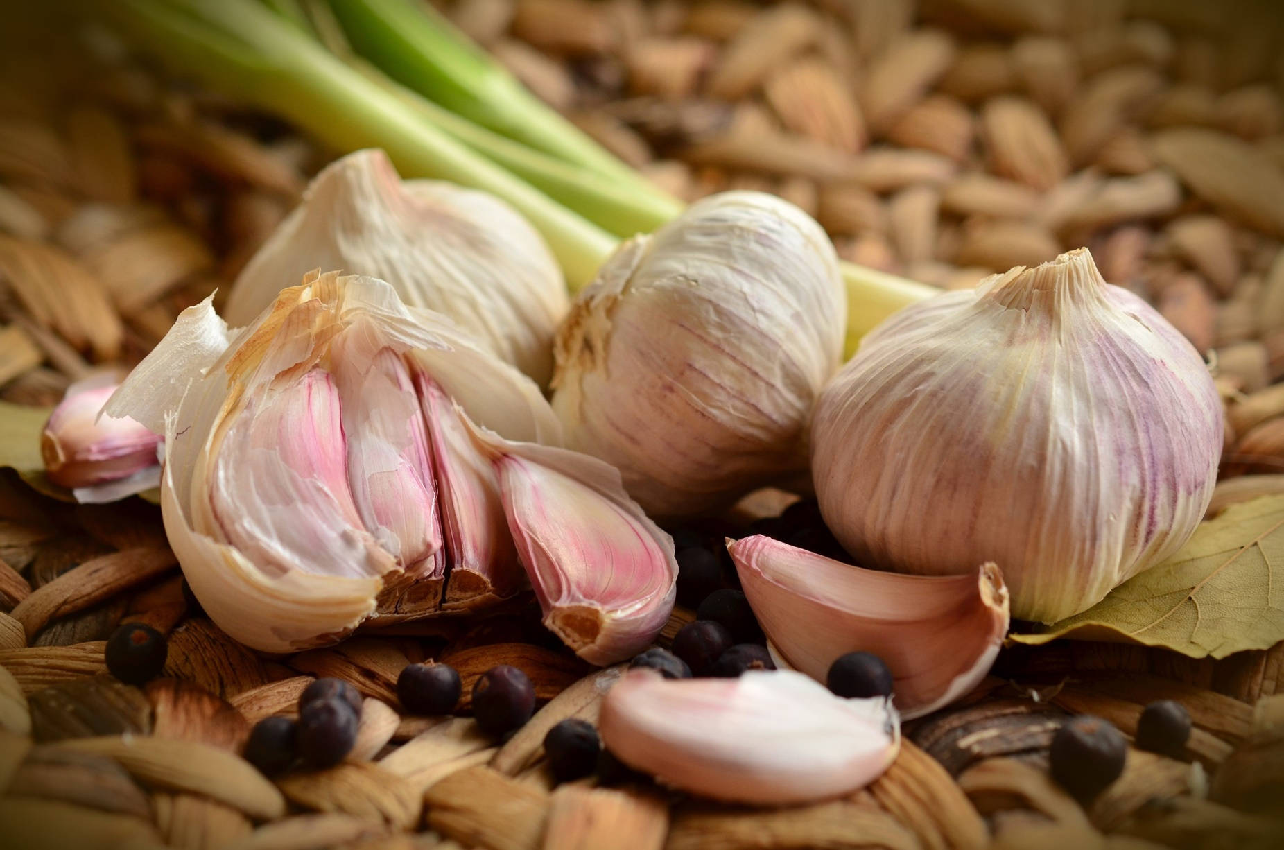 Garlic Vegetable Herb Cloves In Wicker Background