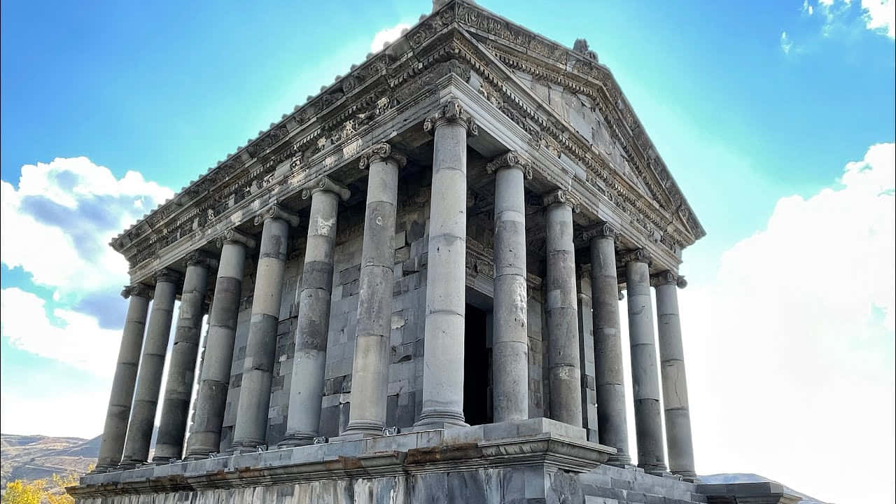 Garni Temple Under Bright Blue Sky Background