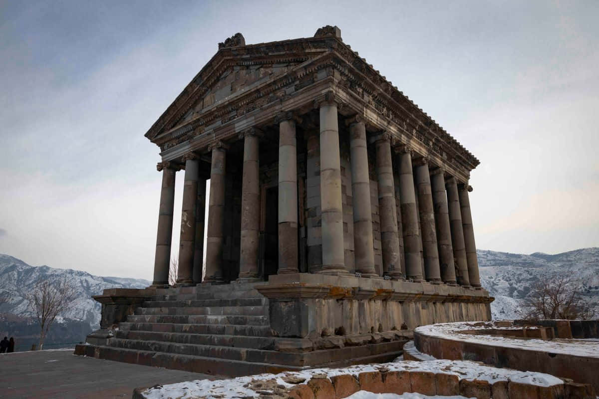 Garni Temple With Melting Snow Background