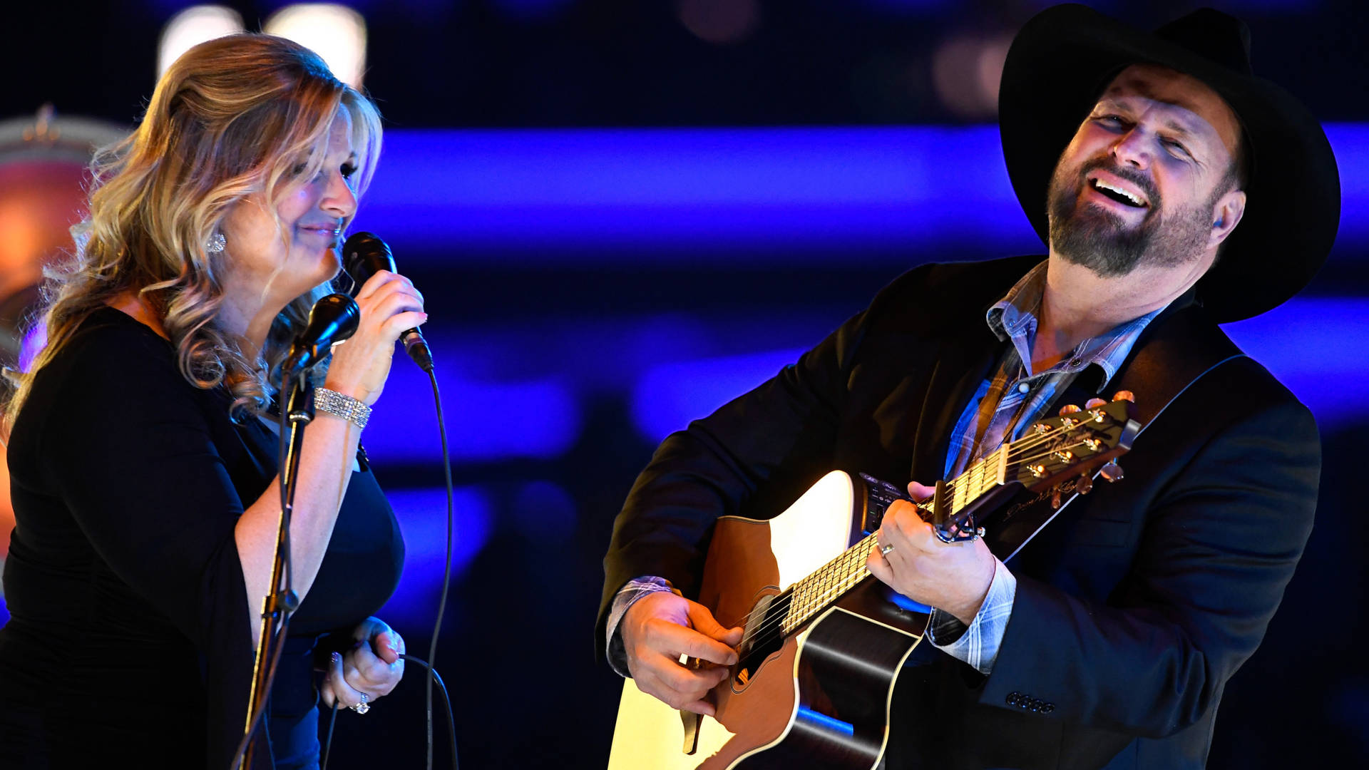 Garth Brooks And A Female Background