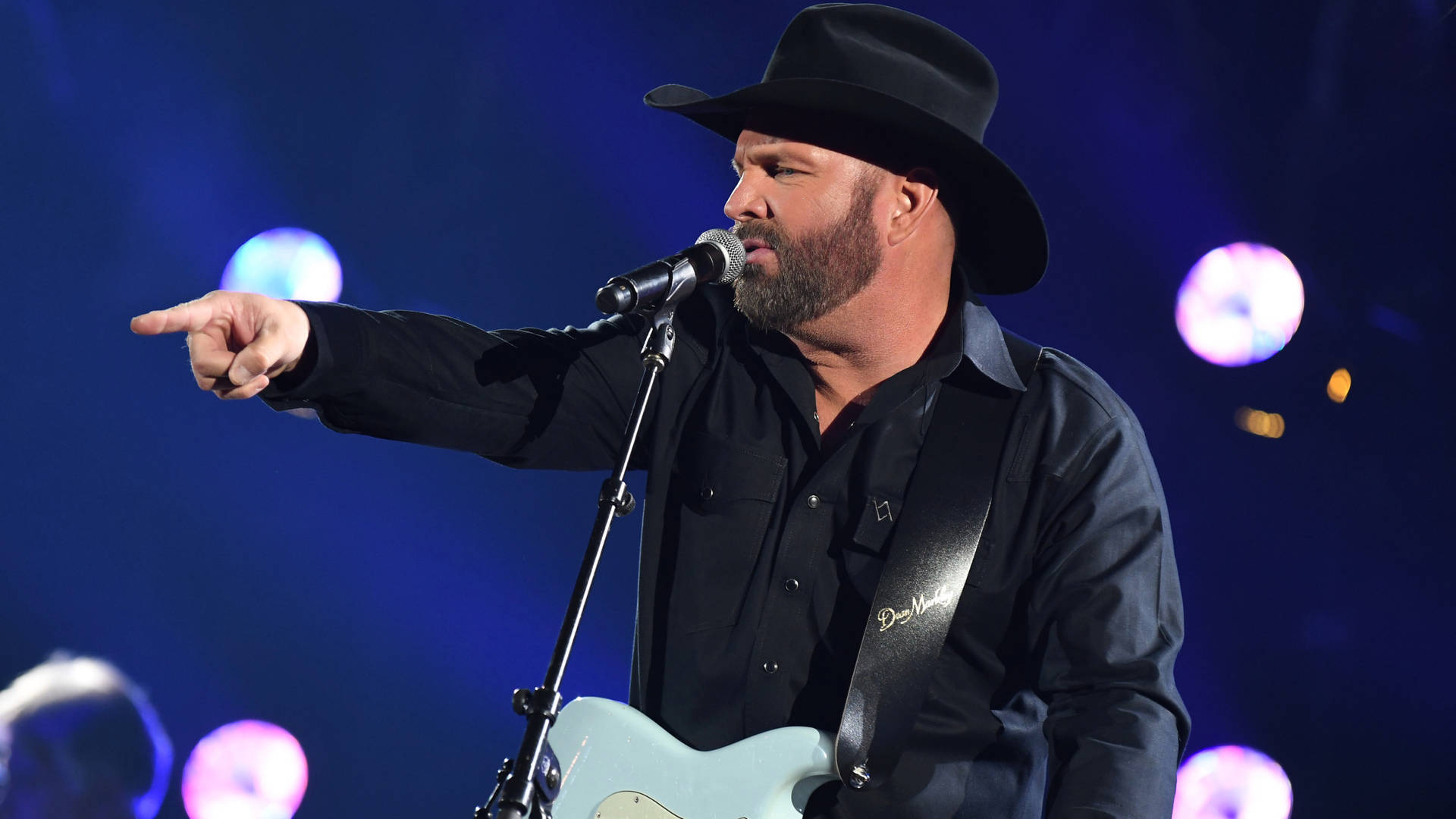 Garth Brooks On Blue Background