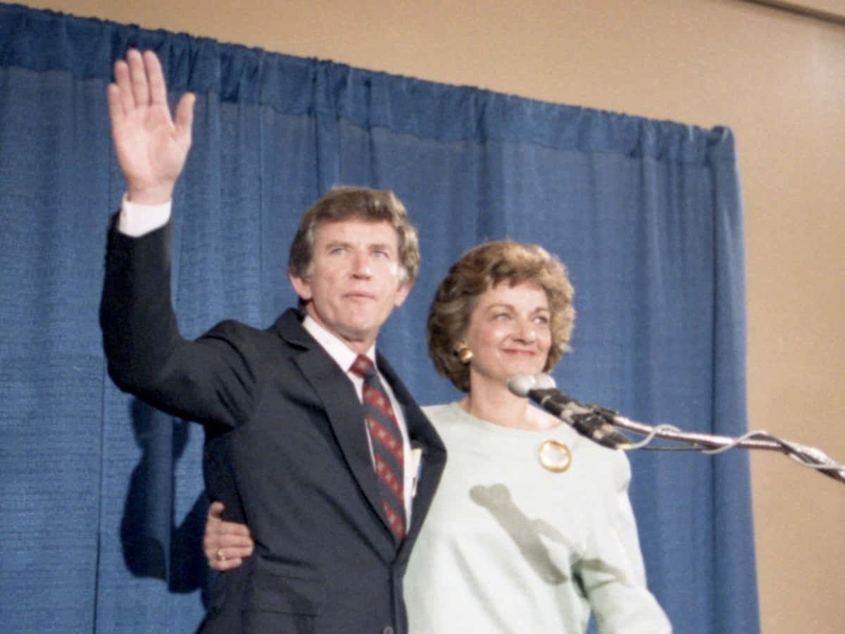 Gary Hart Arm Around Wife Background