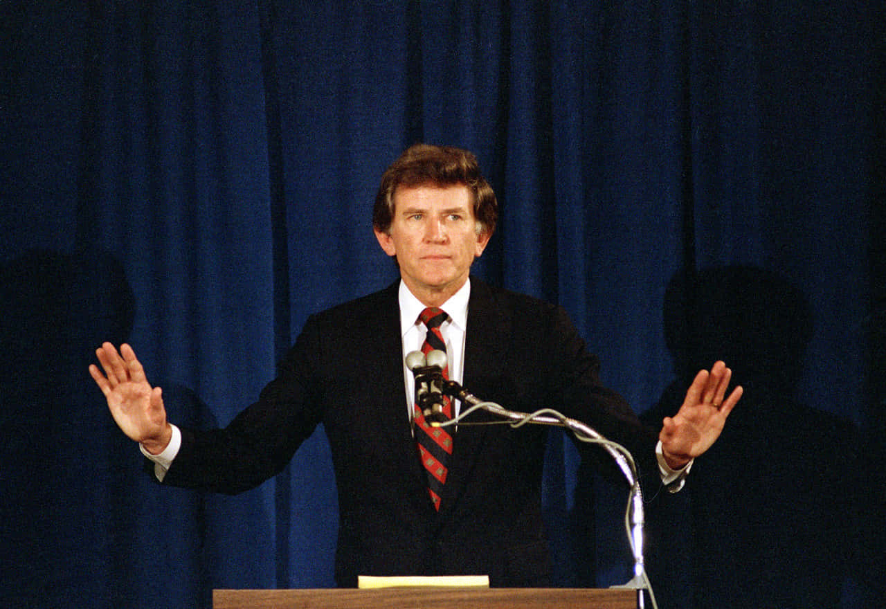 Gary Hart Behind The Podium Background