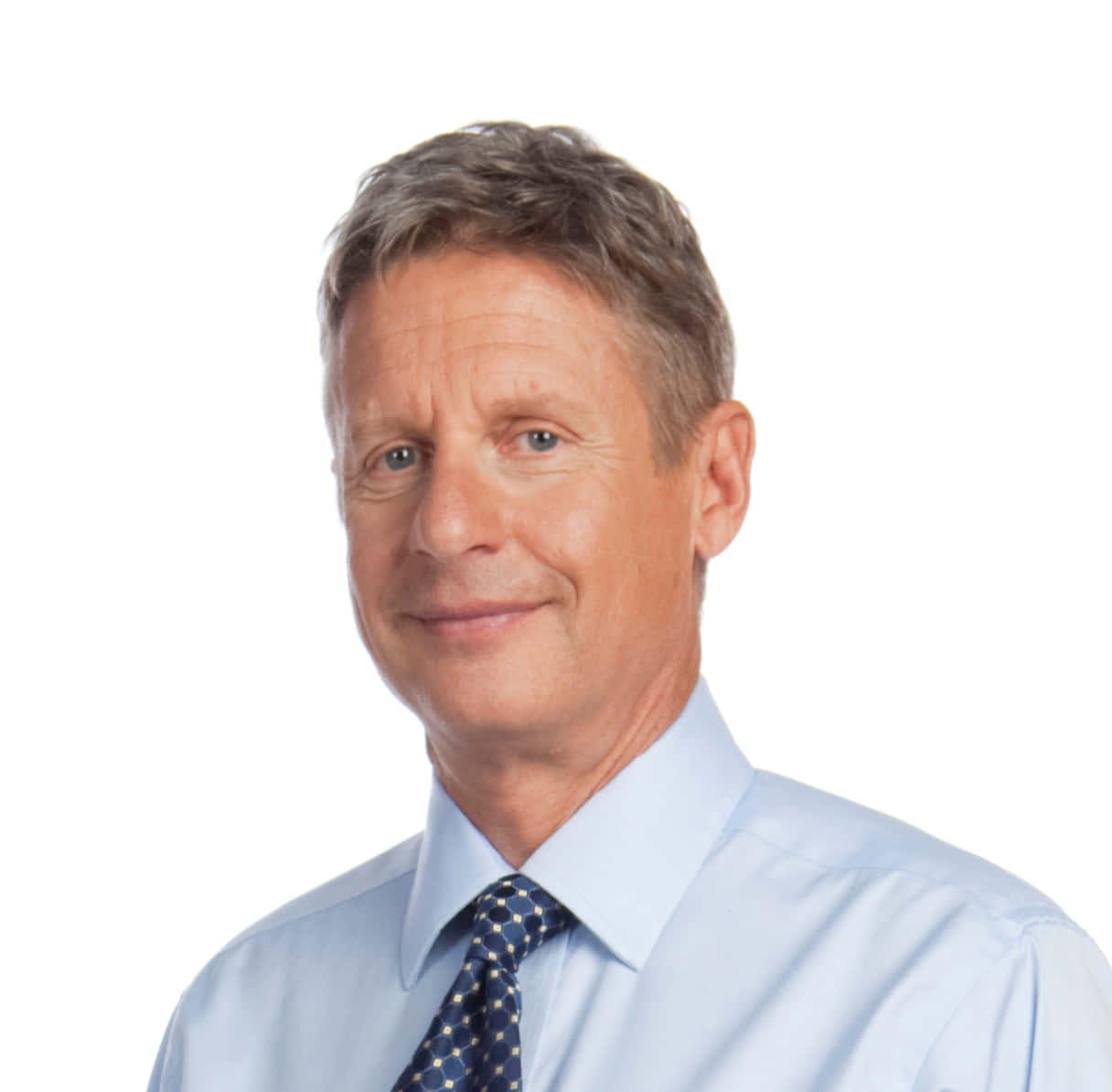 Gary Johnson, American Libertarian Politician, Posing Against A White Backdrop Background