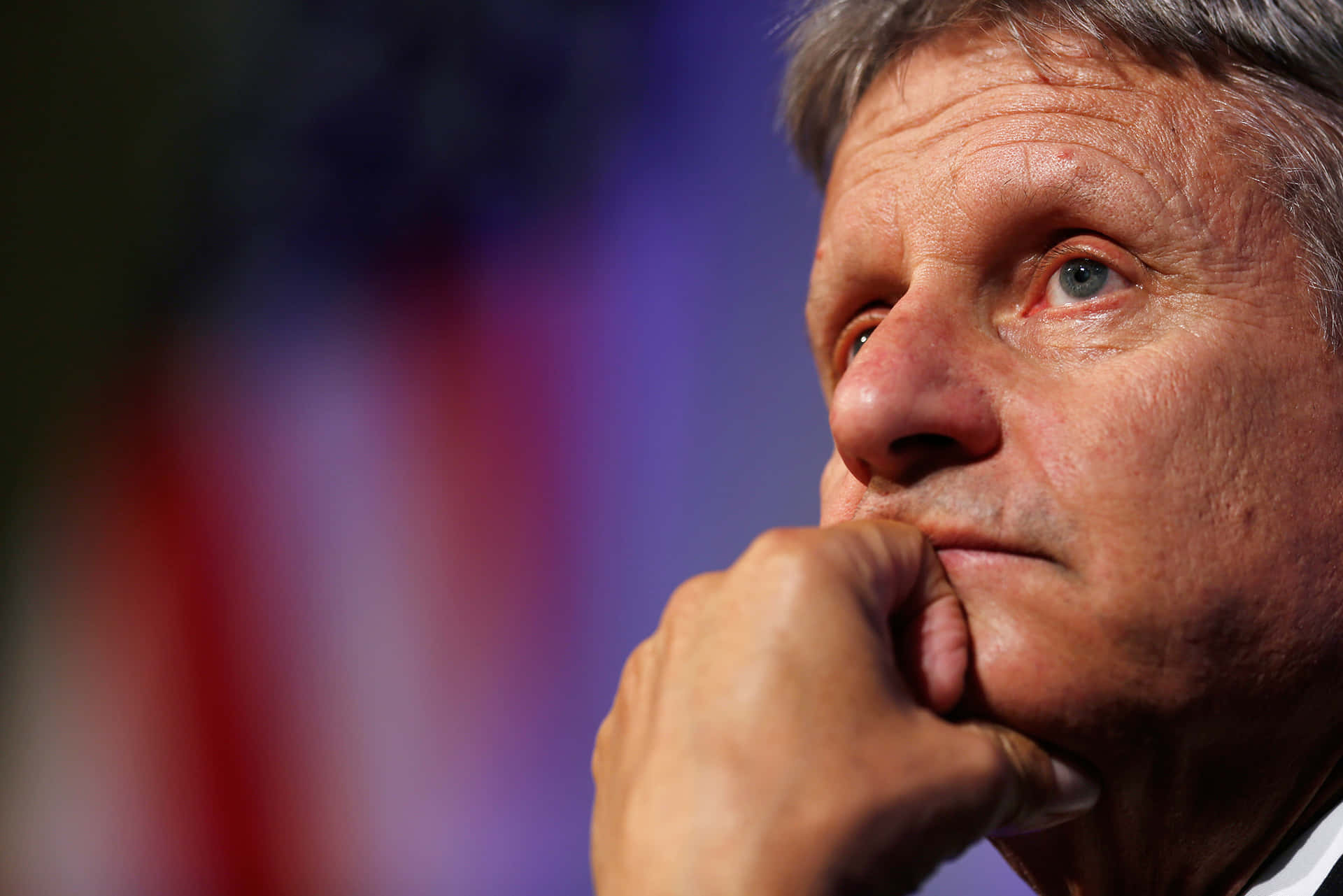 Gary Johnson Cradling His Chin Background