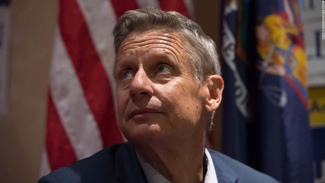 Gary Johnson In Front Of American Flag Background