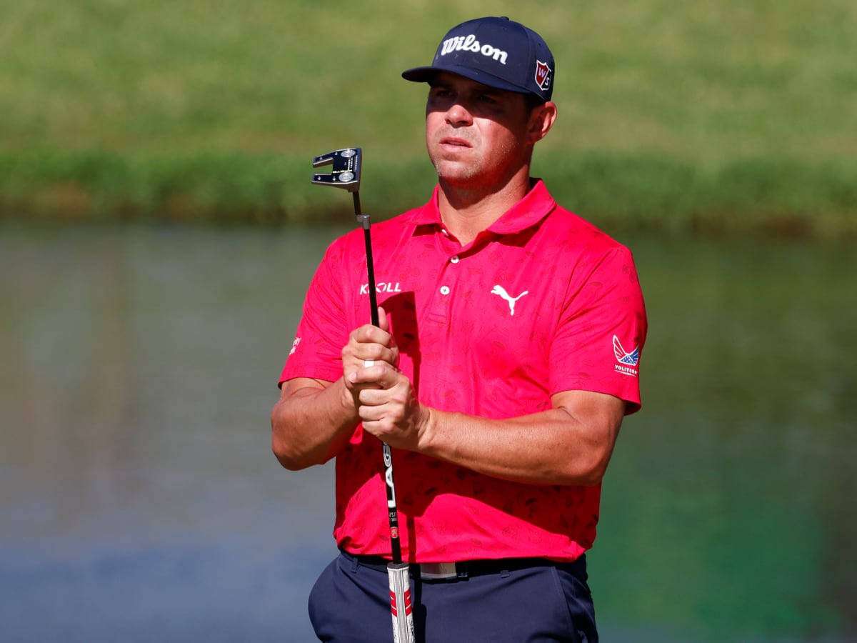 Gary Woodland Grasping Golf Club Background