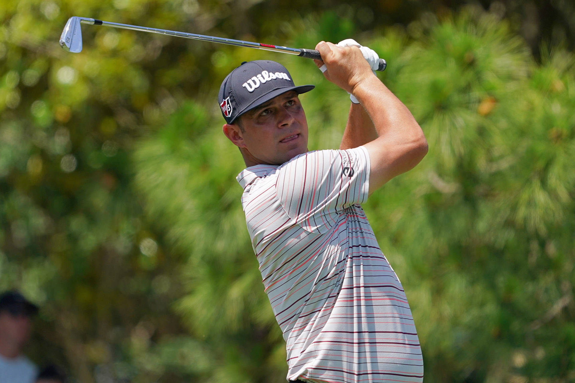 Gary Woodland Holding Golf Club Background