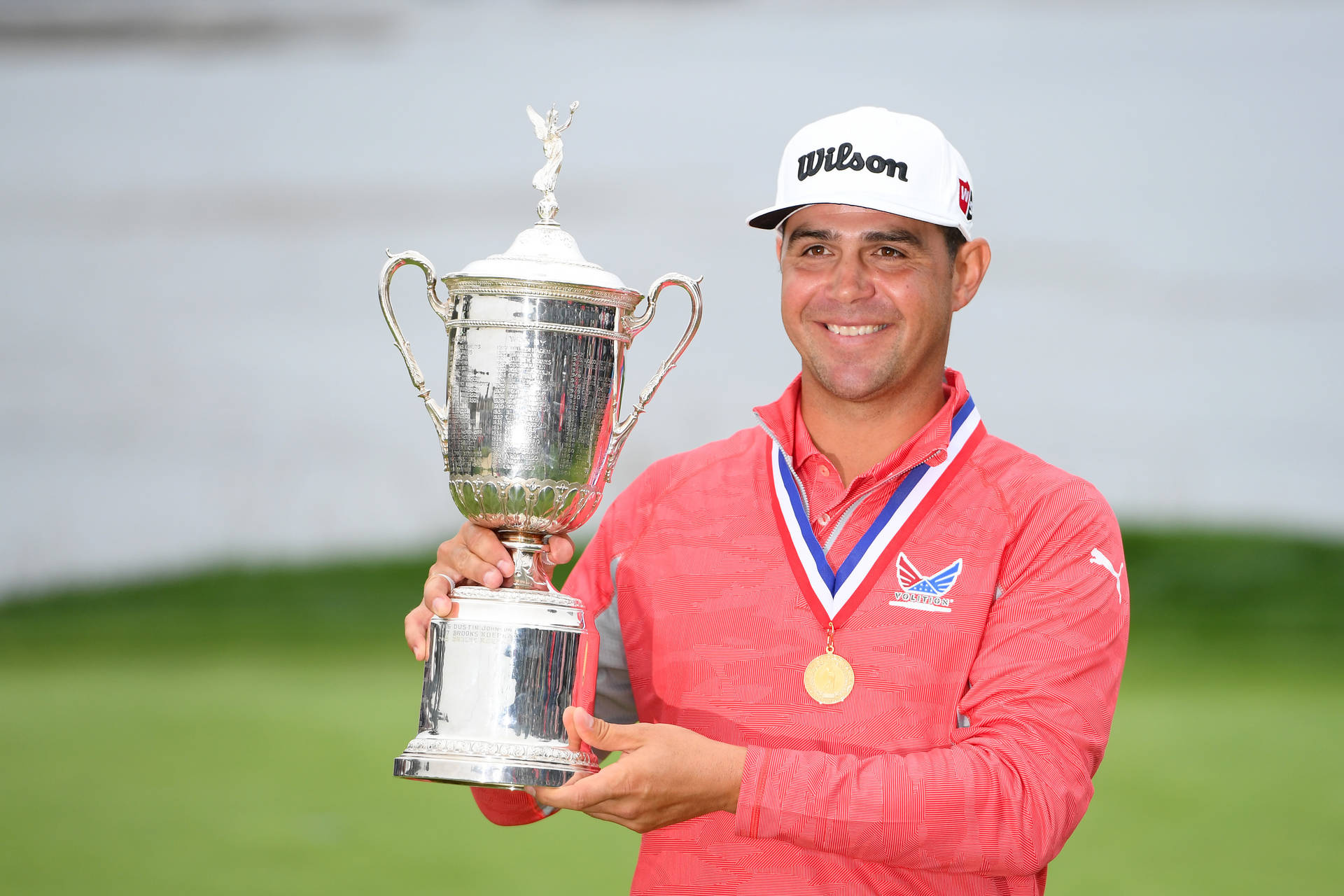 Gary Woodland Holding His Trophy Background