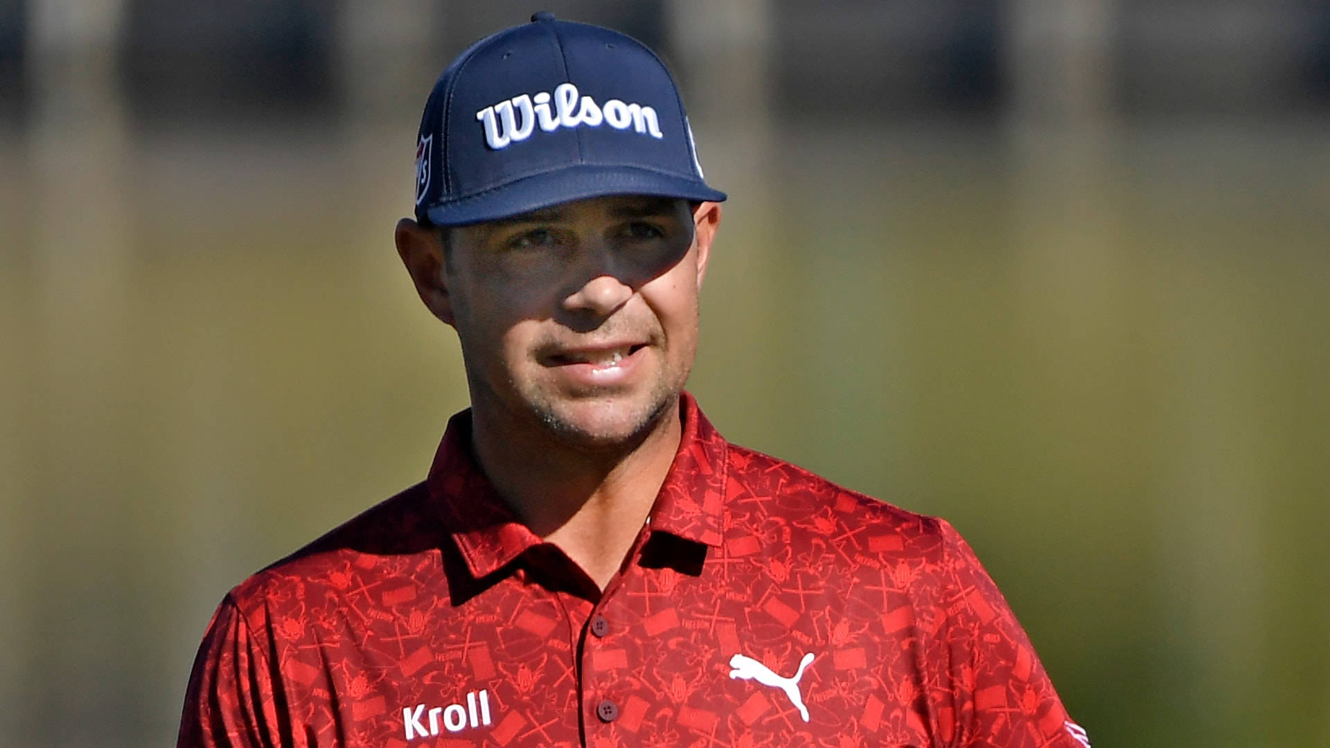 Gary Woodland In Red Puma Shirt Background