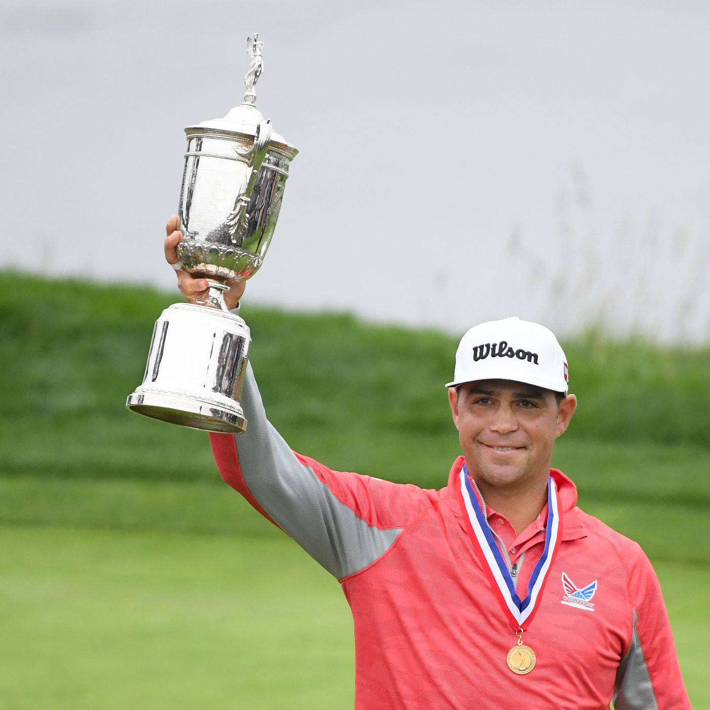 Gary Woodland Raising Trophy