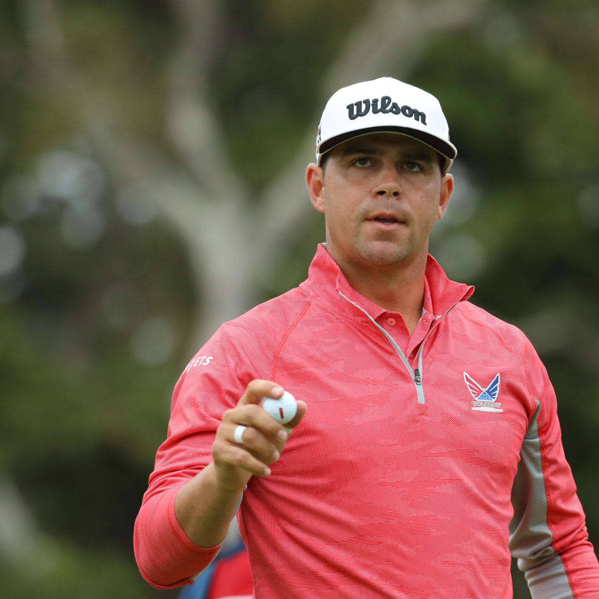 Gary Woodland Wearing Red Jacket Background