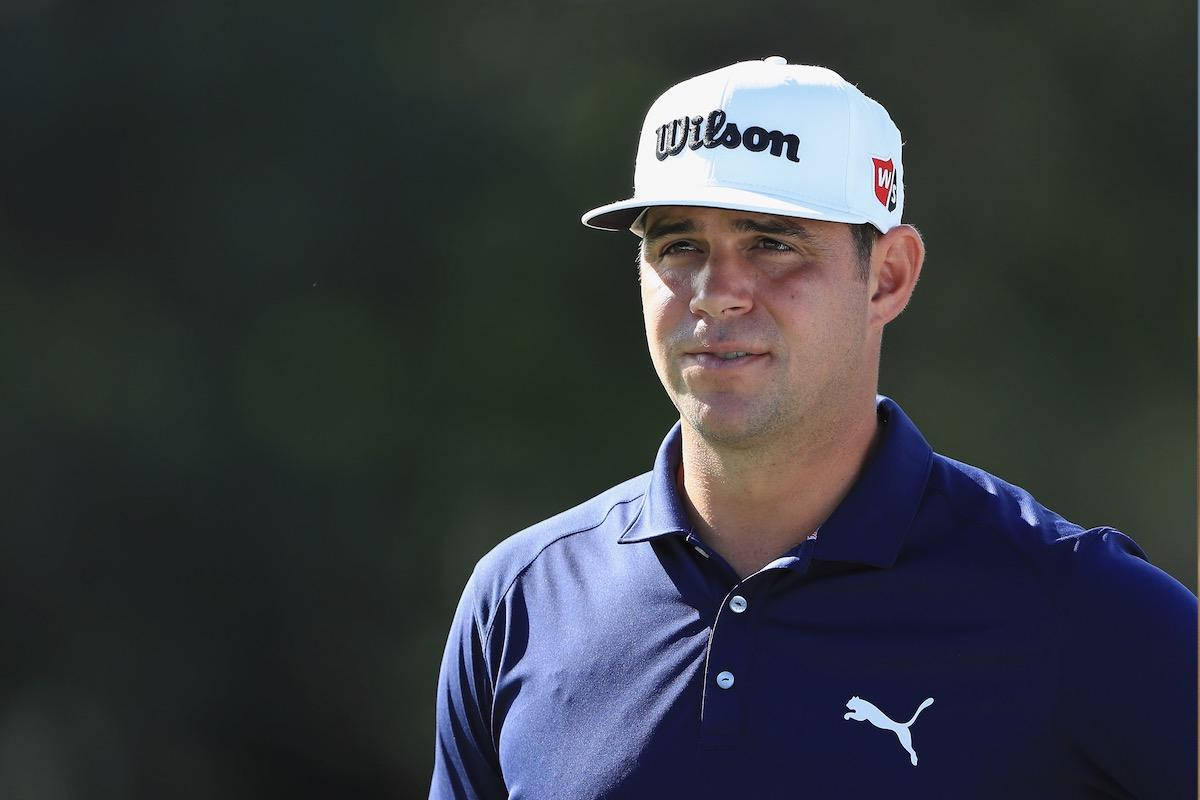 Gary Woodland Wearing White Cap Background