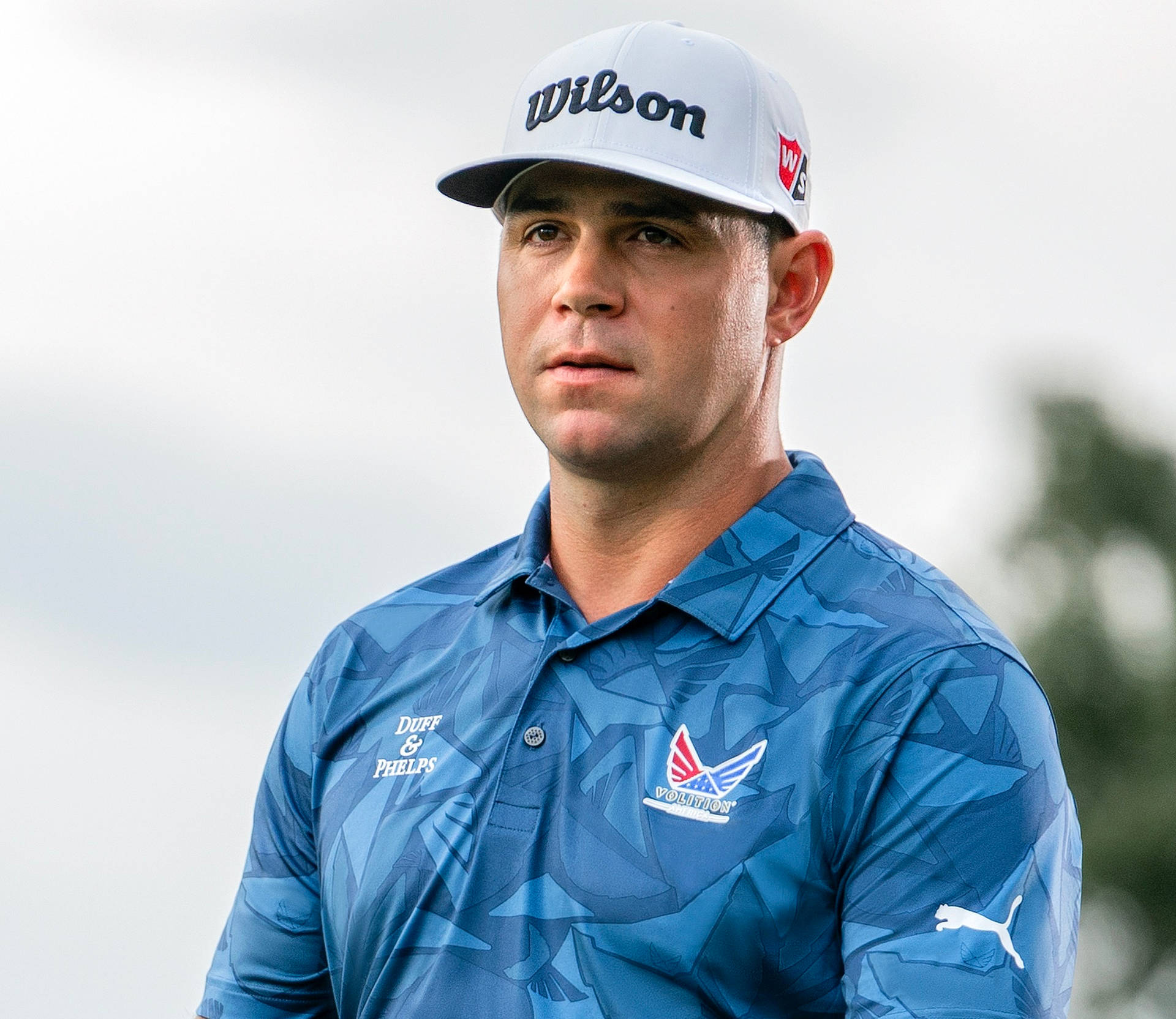 Gary Woodland Wearing White Cap