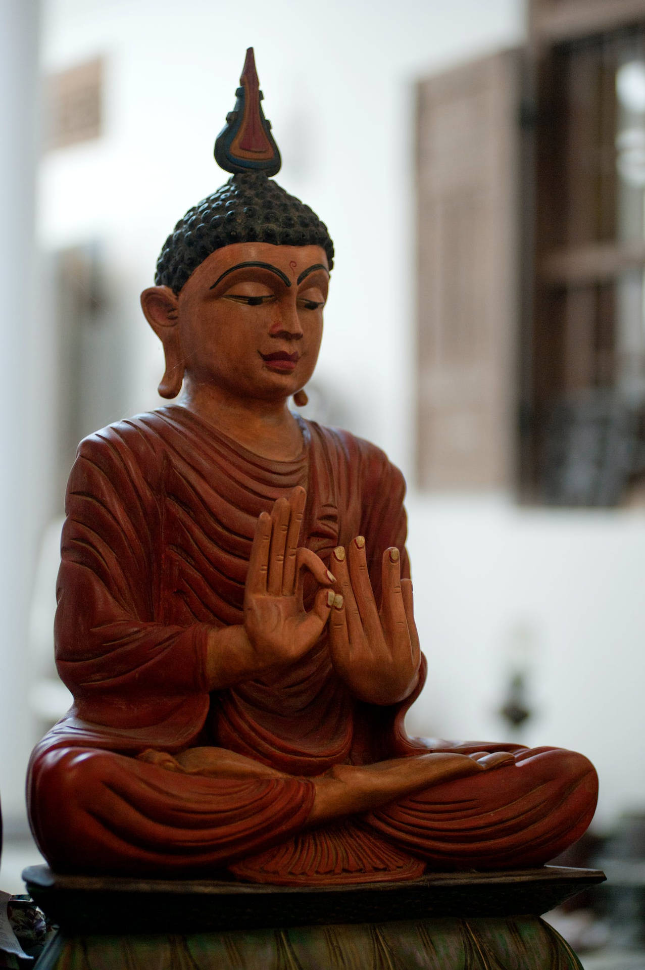 Gautam Buddha Sculpted Wooden Statue Background