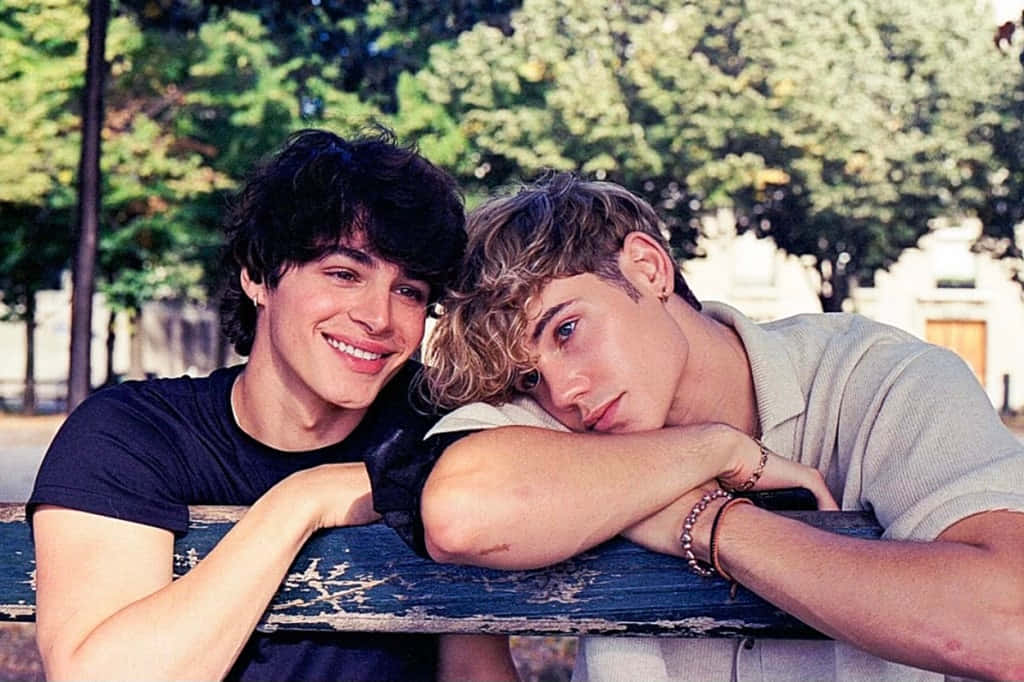 Gay Boys Leaning On The Fence