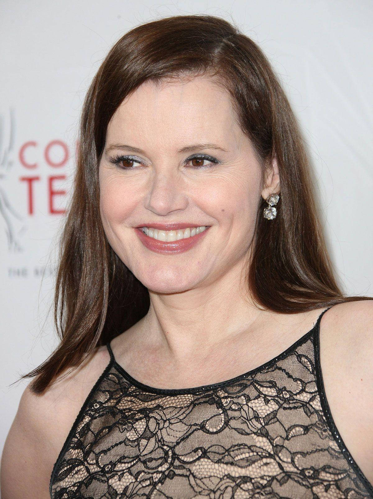 Geena Davis In A Black Lace Dress Background