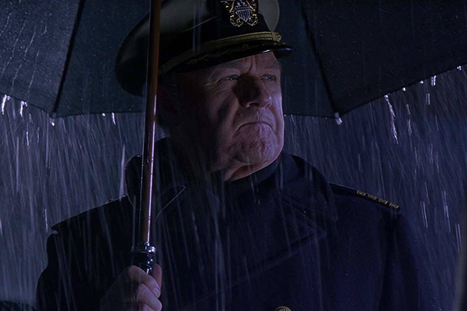 Gene Hackman On Rain Background