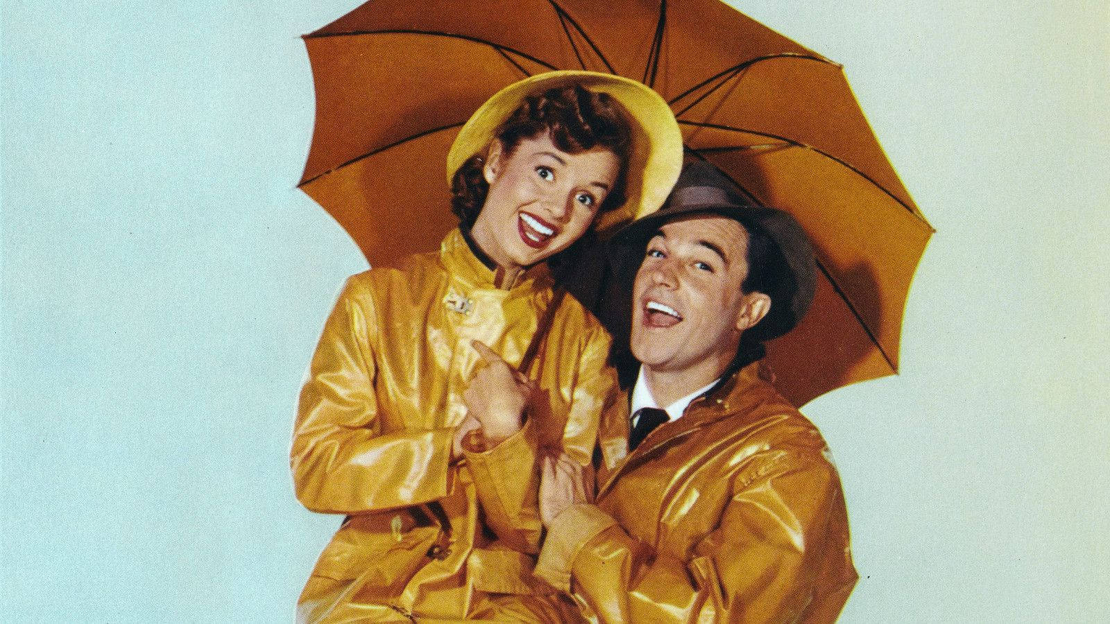 Gene Kelly Under An Umbrella Background