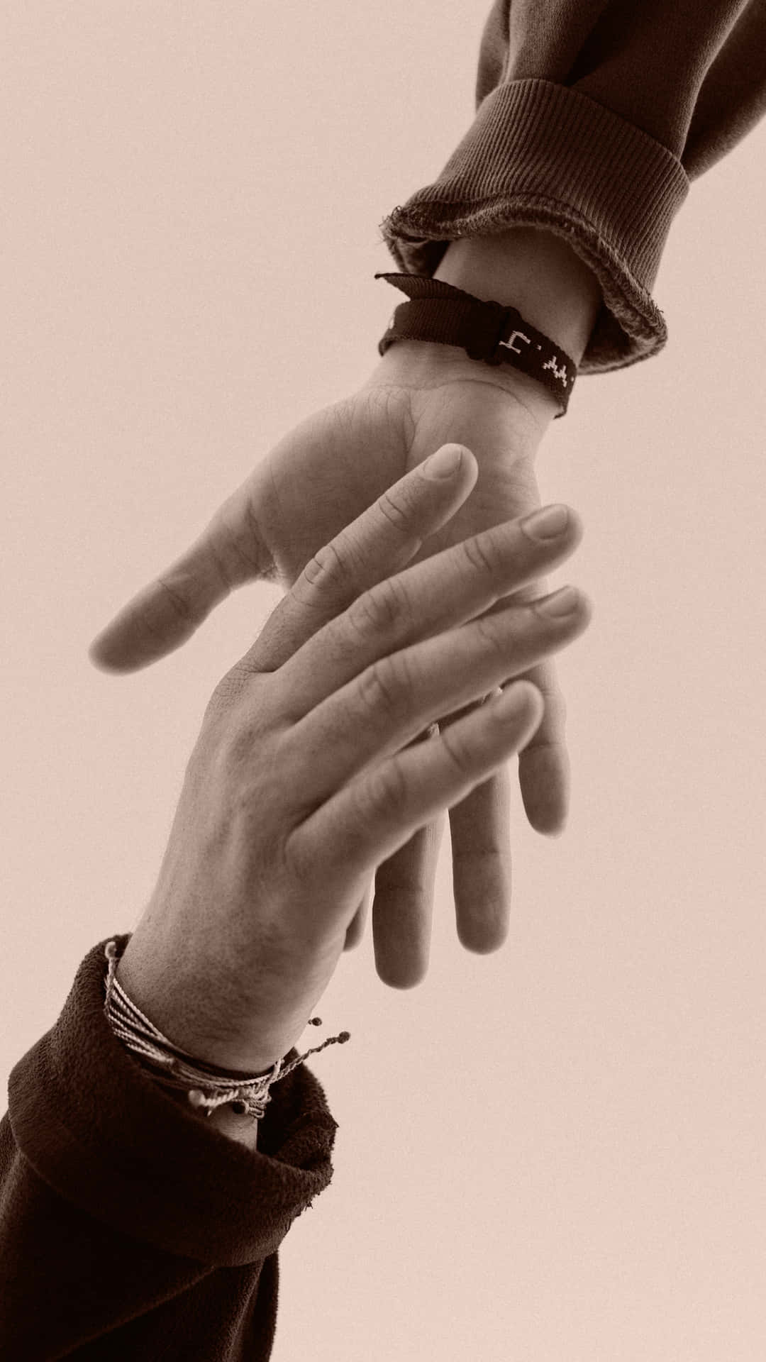 Gentle Handshake With Bracelets Background