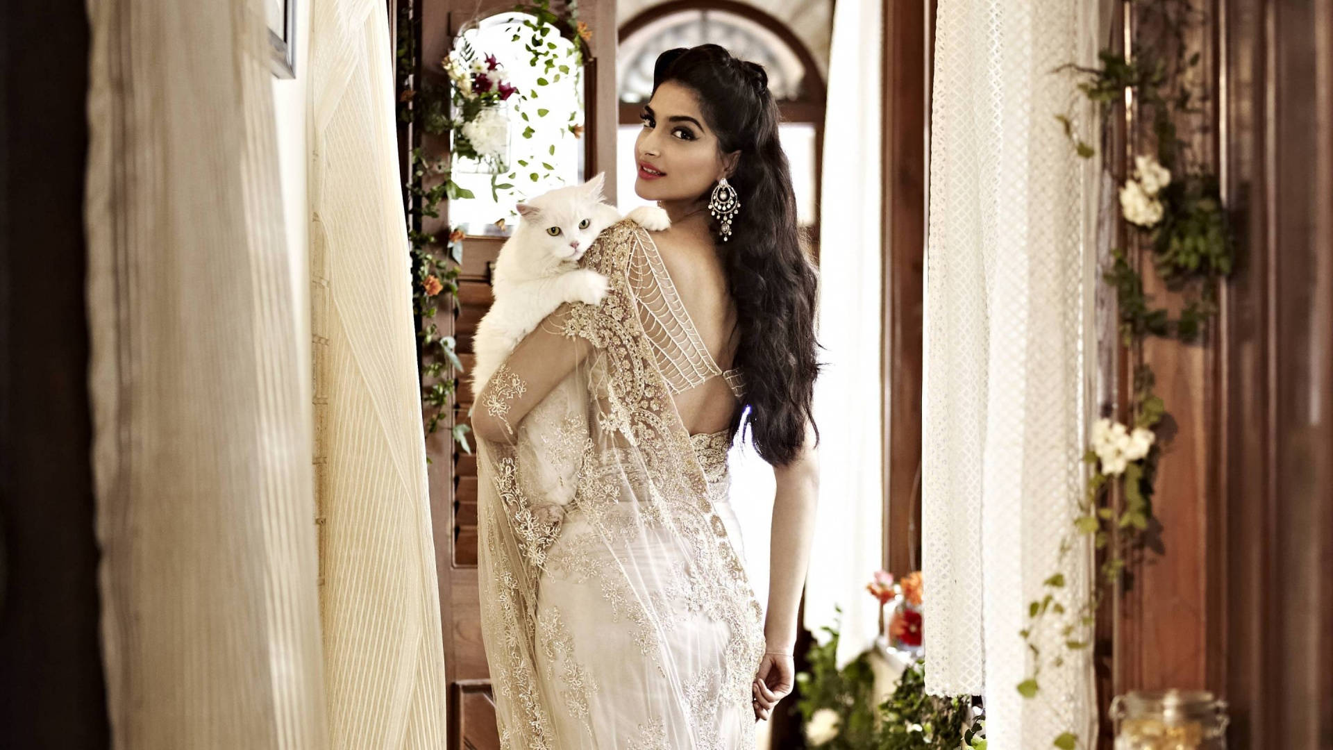 Gentle Sonam Kapoor With Cat Background