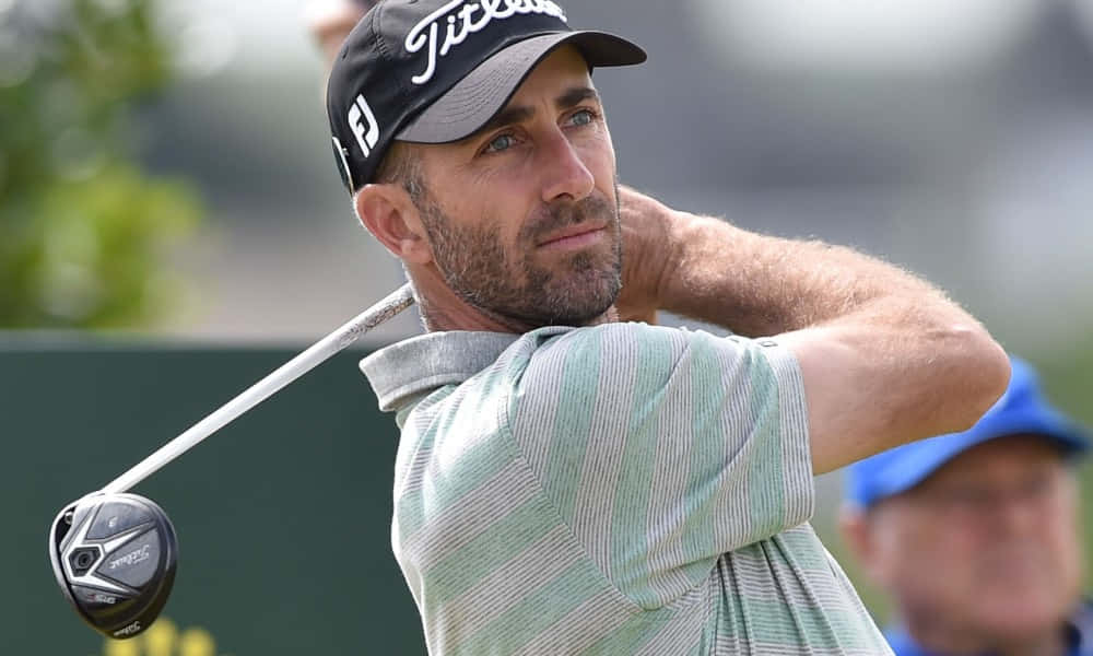 Geoff Ogilvy -- A Striking Presence On The Golf Course Background