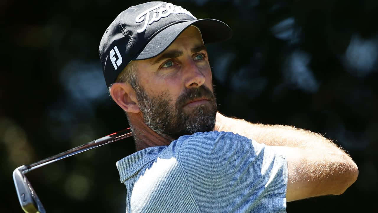 Geoff Ogilvy Staring Ahead With Laser Focus Background