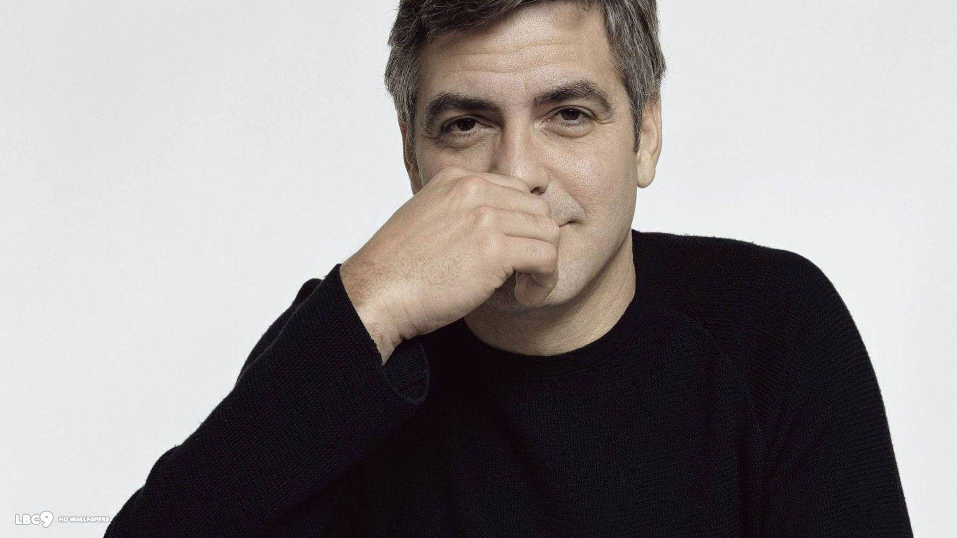 George Clooney Hands On His Face