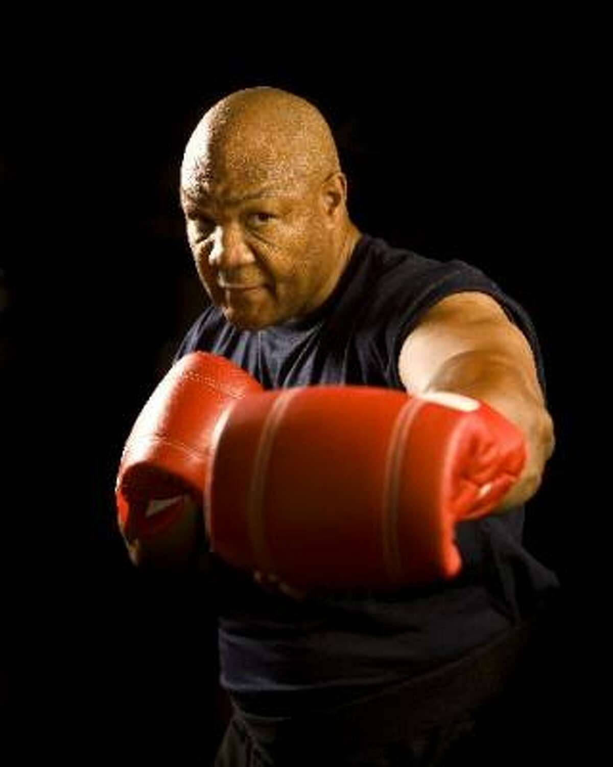 George Foreman Gloved Background