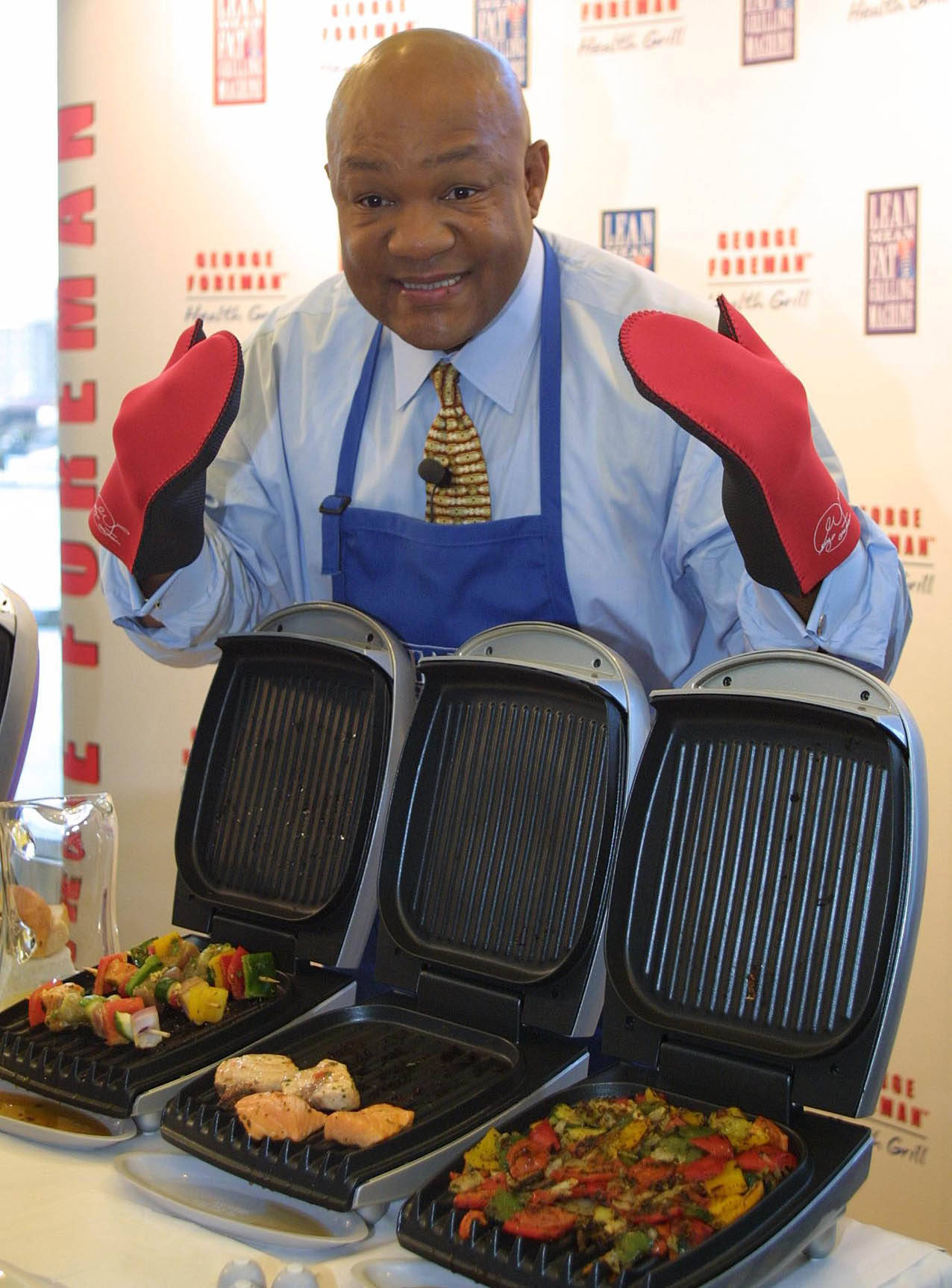 George Foreman In Mittens Background