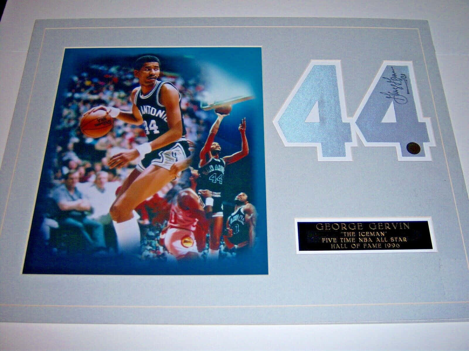 George Gervin Shooting A Basketball Framed Memorabilia Background
