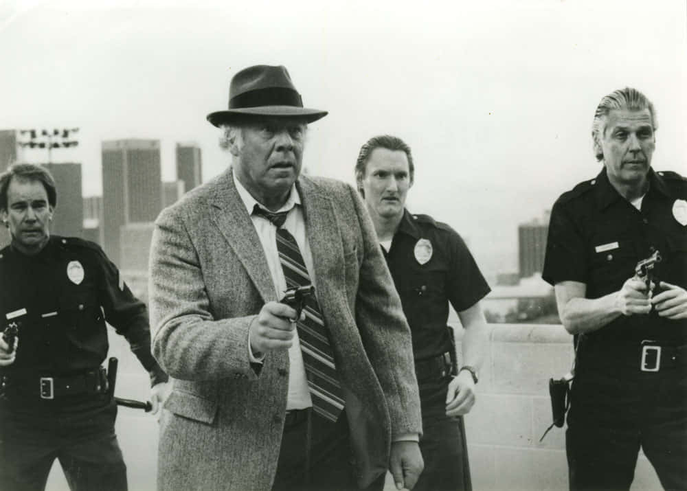 George Kennedy Police Scene Black And White Background