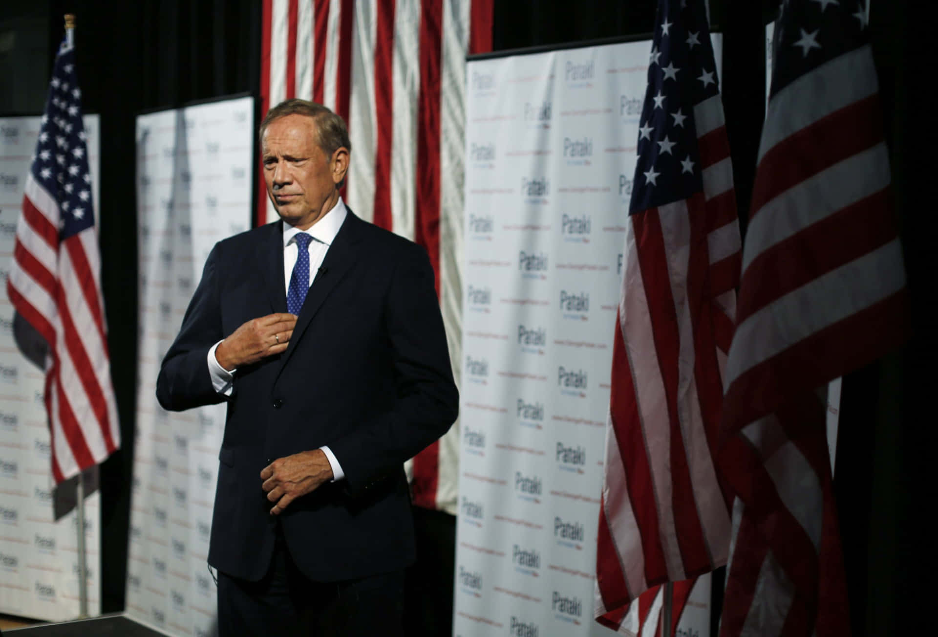 George Pataki Portraying Leadership In Formal Attire Background