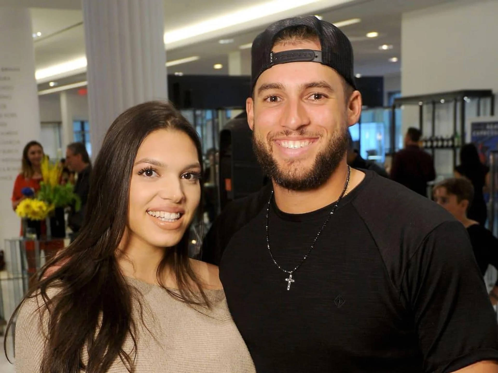 George Springer And Wife In An Airport Background