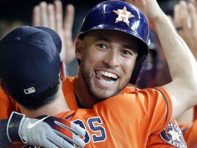 George Springer Hugging A Teammate Happy Background