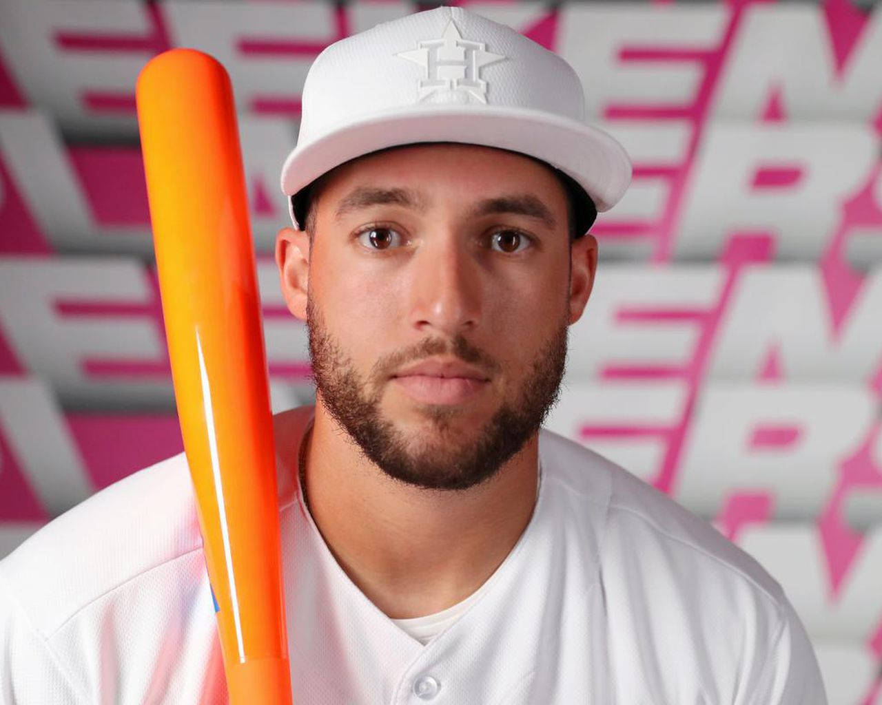 George Springer Wearing A White Shirt And Cap Background