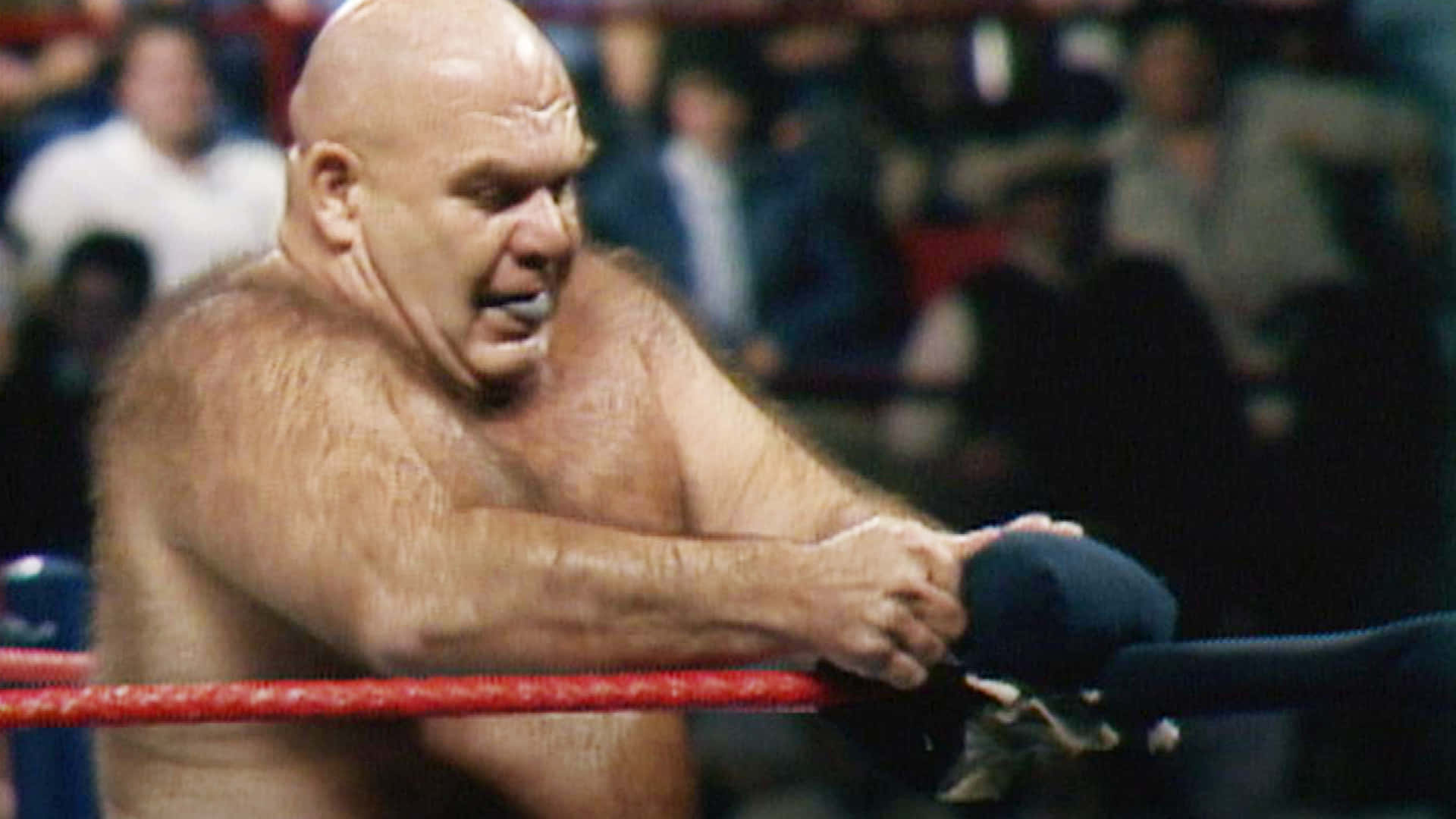 George Steele Ripping Turnbuckle Pad Background