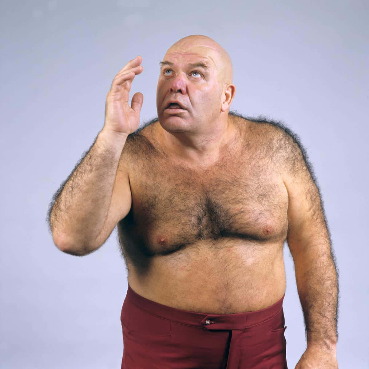George Steele Wearing Maroon Trouser Background