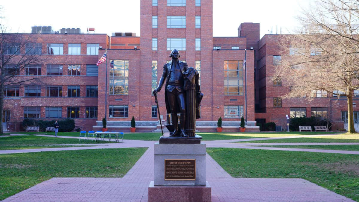 George Washington University Statue At Sunrise Background