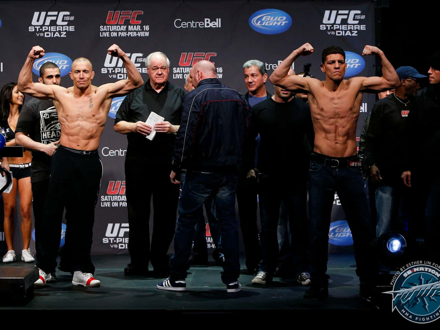 Georges St-pierre And Nick Diaz Face-off During The Weigh-in Background