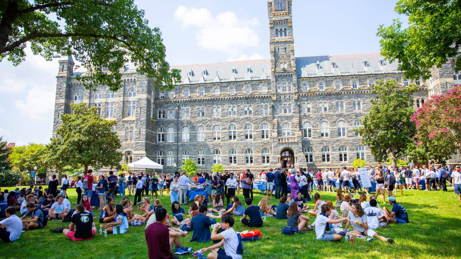 Georgetown University Student Event Conducted In A Vibrant Atmosphere Background