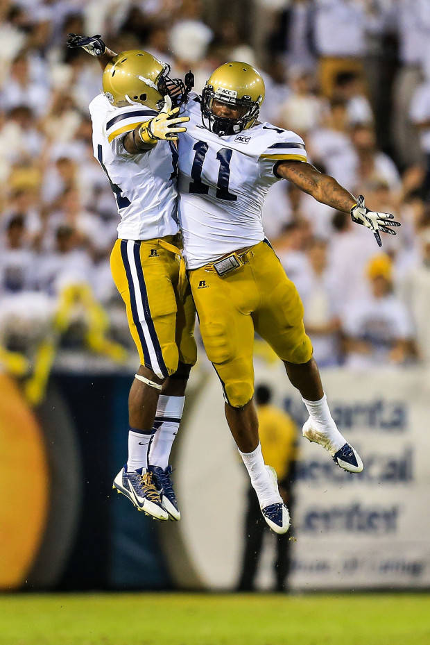 Georgia Tech Players Chest Bump Background